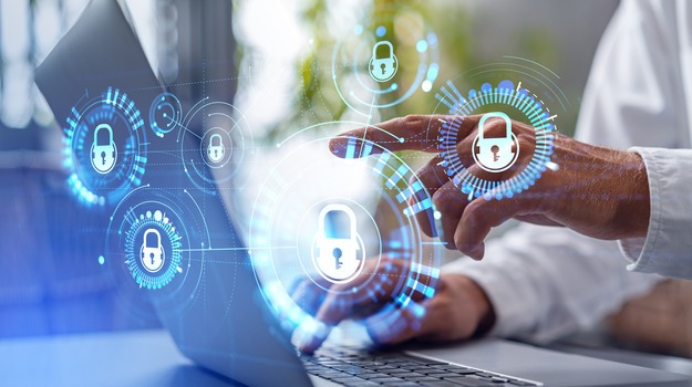 Businessman finger point at laptop and digital cybersecurity circuit hud hologram, glowing padlock icons and earth sphere. Concept of data protection, internet safety and global protection