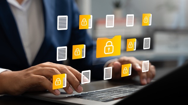 Businessman using laptop to access secure digital folder and document, Cybersecurity, Data privacy, Protected information. Concept of safe file management, encryption,modern digital security systems